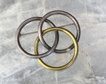 Two Tone Sterling and Brass Three Ring Pin
